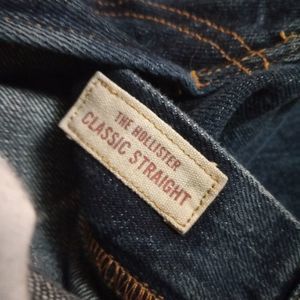 The hollister classic straight jeans distressed hems dark blue wash
